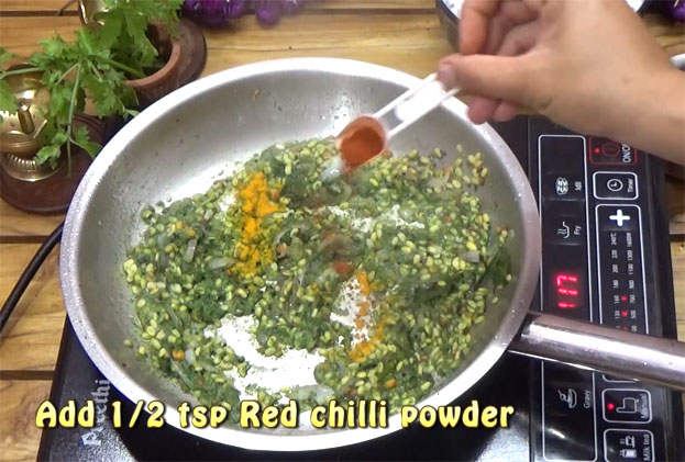 Add turmeric and red chilli powder