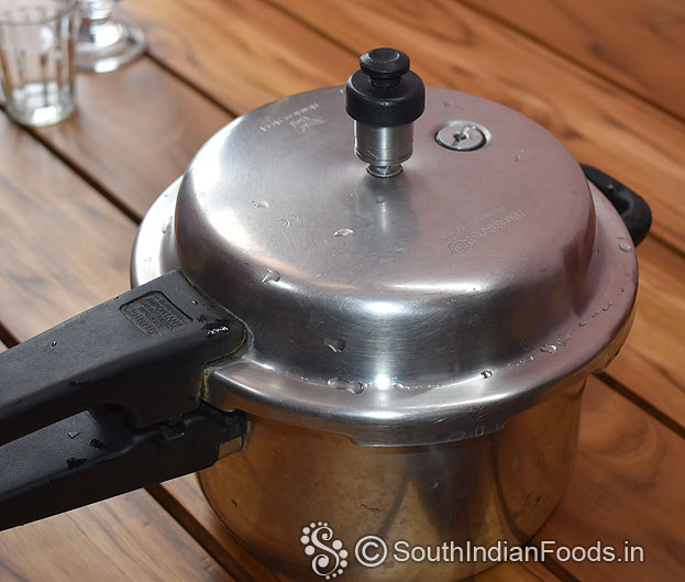Cover lid & cook for 3 to 4whistles