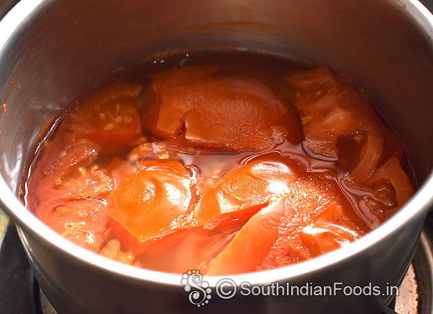 Boil 2 tomatoes for 5 min, let it cool
