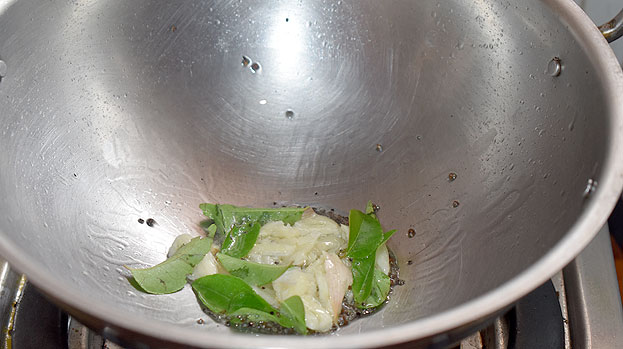 Add curry leaves, garlic, saute