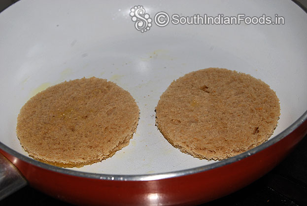 Heat pan add ghee toast bread slices