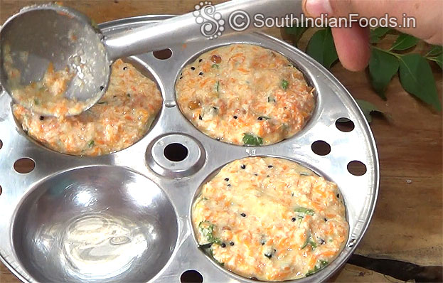 Grease idli plates, Pour batter