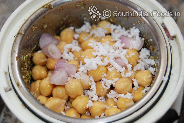 Add sambar onion, coconut, coarsely grind with out water