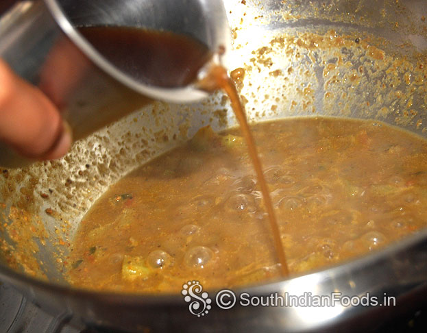 Add tamarind water, let it boil till raw smell out