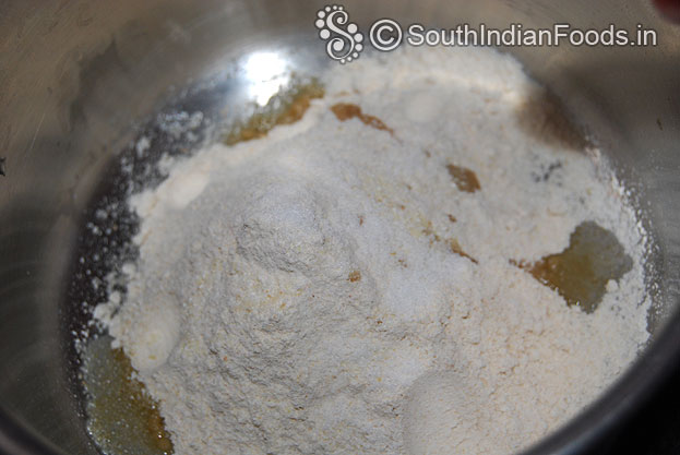 Add wheat flour, rava, salt, 1 tbsp oil mix well add water knead it make soft dough