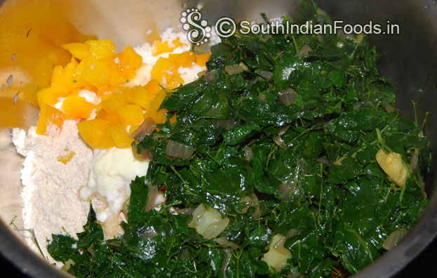 Add sauteed drumstick leaves, water mix well make sticky dough