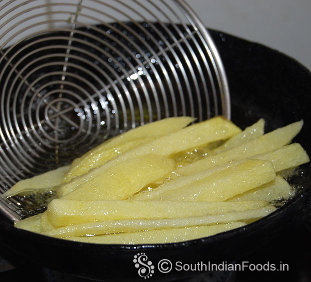 Heat oil, add potatoes, deep fry for 3 min