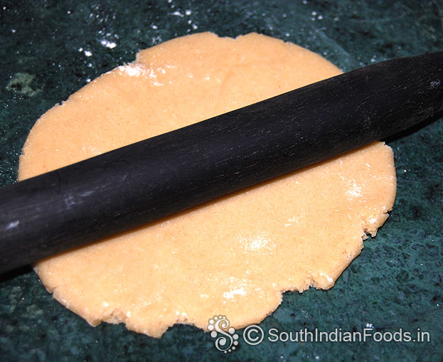 Sprinkle flour, roll out into thin/thick chapathi