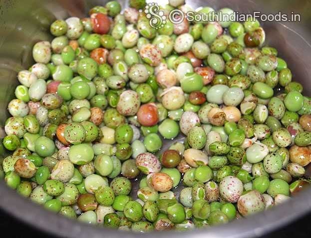 Peel off the green toor dal skin, wash and boil