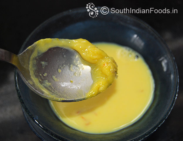 Pour saffron basundi to a serving bowl add paal adai