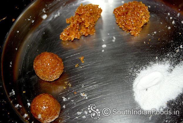 Divide the mixture into equal size balls,sprinkle rice flour to avoid sticking