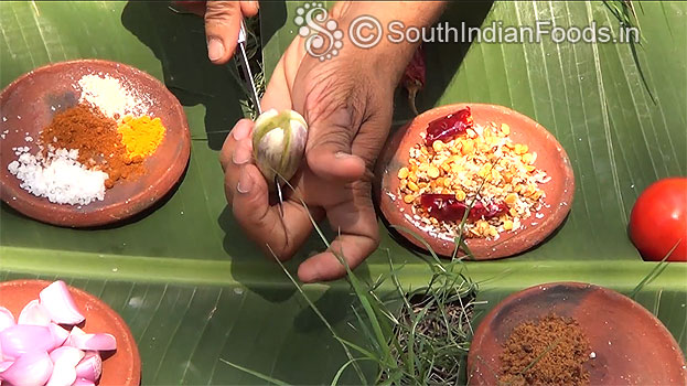 Slit brinjal into four