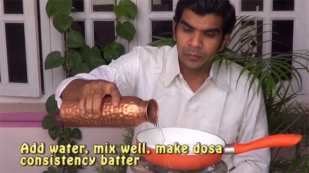 Add enough water, mix well, and make dosa consistency batter
