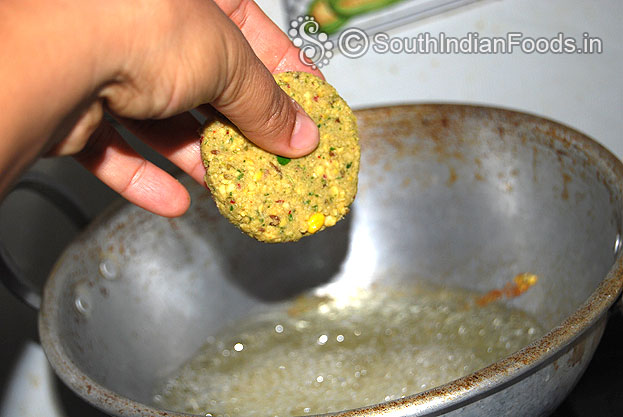 Heat oil in a pan put prepared vada, deep fry till crisp and golden brown