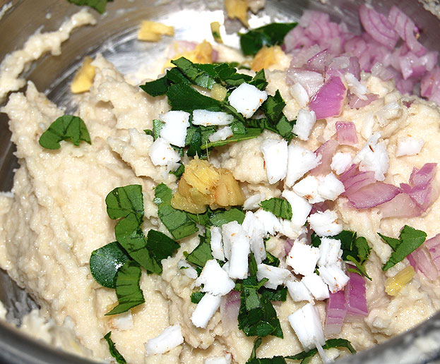 Add onion, ginger, green chilli, coconut, curry leaves & salt mix well
