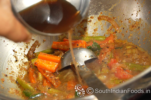 Add ground paste, tamarind water