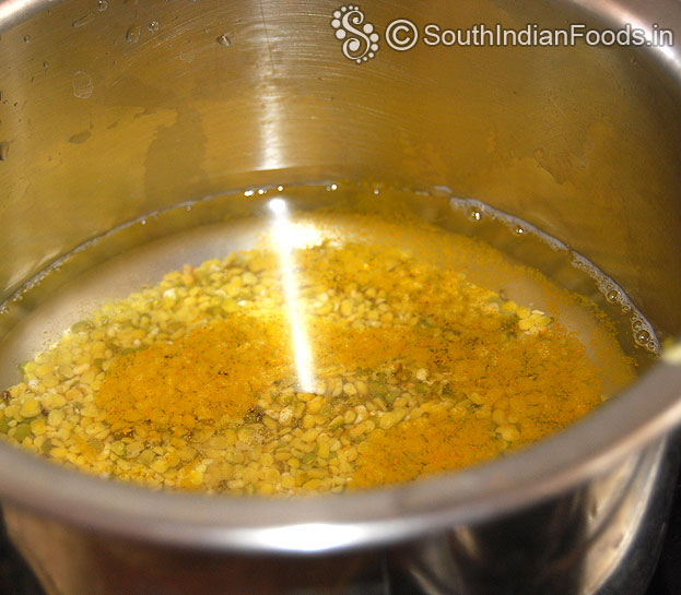 Boil toor dal with turmeric powder