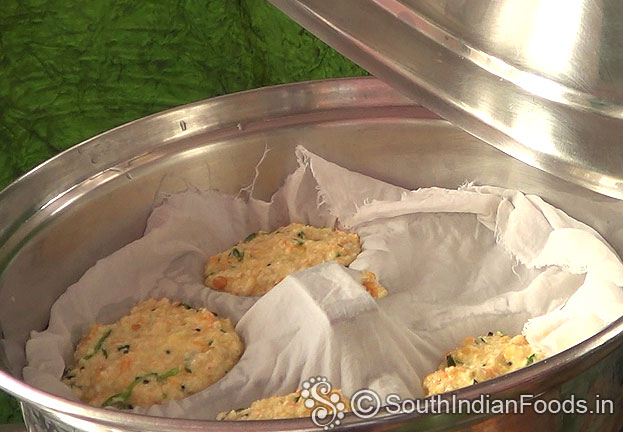 Steam oats idli in an idli cooker for 10 min