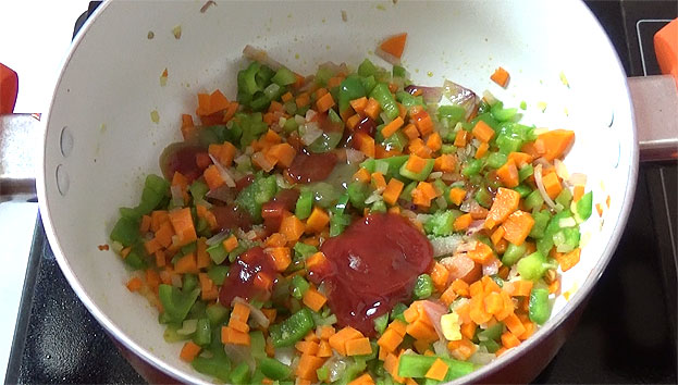 Add green chilli sauce, red chilli sauce, tomato sauce