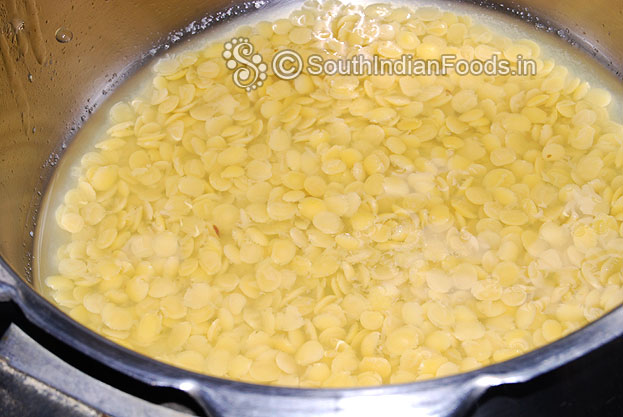 Pressure cook toor dal for 4 whistles