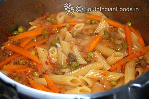 Perfectly cooked schezwan pasta mix gently