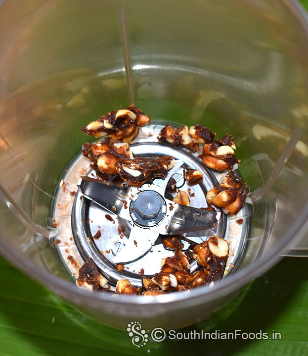 In a mixer jar add peanut chikki, coarsely grind