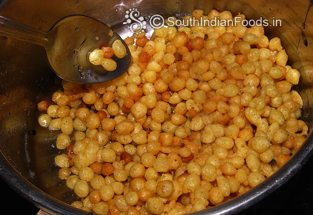 place fried boondis in sugar syrup mix gently