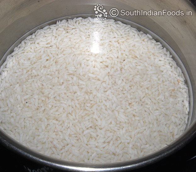 After 5 hours soaked raw rice ready, drain water