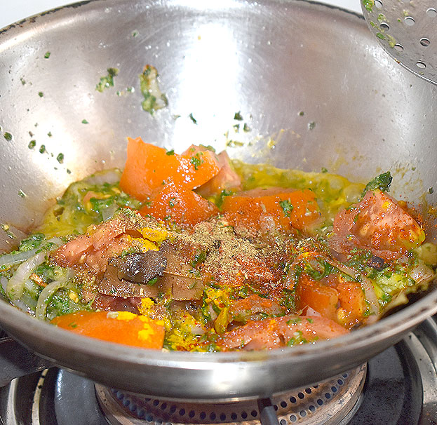 Add tomato, red chilli powder, garam masala, turmeric powder