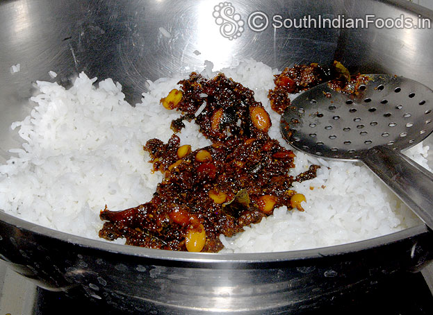 Add boiled rice & tamarind paste