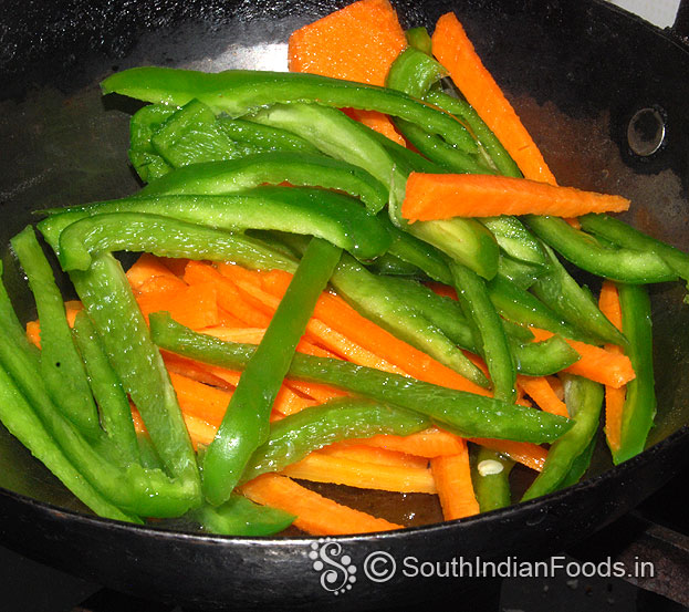 Heat 1 tbsp oil in a pan, add carrot & capsicum
