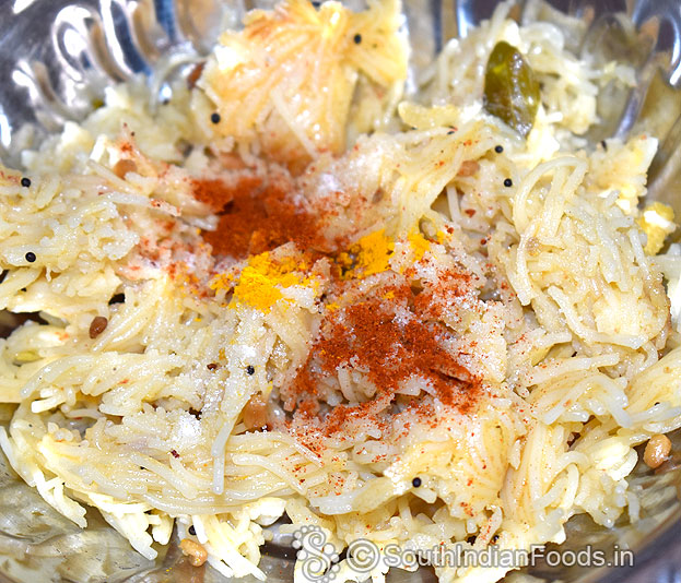 In a bowl add leftover semiya upma,turmerci, red chilli powder, & salt