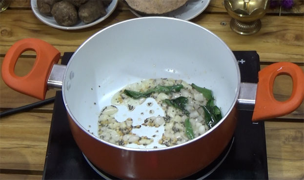 Add garlic, curry leaves