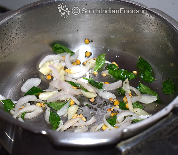 Heat 1 tbsp oil, 2 tbsp ghee, add mustard, chana dal, urad dal, onion, garlic, curry leaves, green chilli