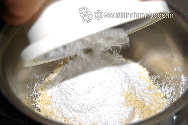 In a bowl add pottukadalai powder & sugar cardamom powder mix well