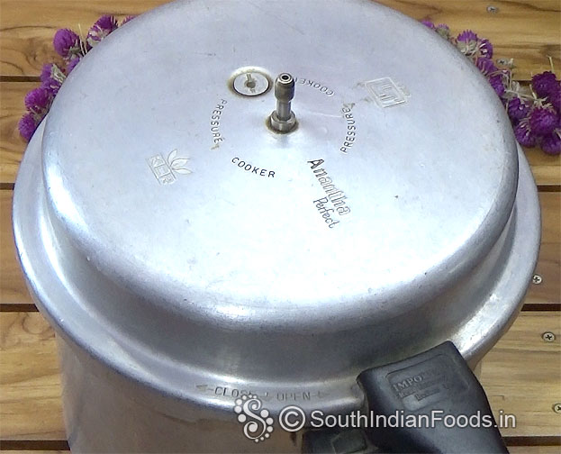 Pre-heat pressure cooker 10 min on low flame