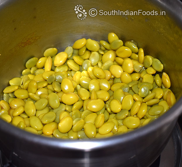 Boil field beans with turmeric, red chilli powder, salt added water till soft.