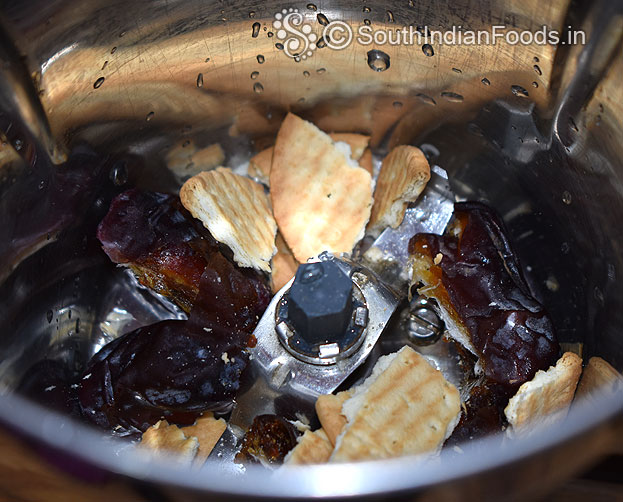 In a mixer jar add dates, marie biscuits