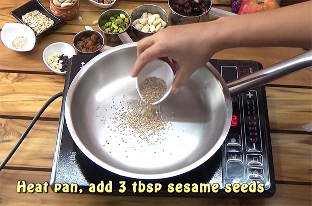 Add sesame seeds, roast till it splutter