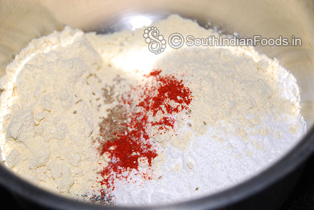 Add roasted gram flour, red chili powder mix well