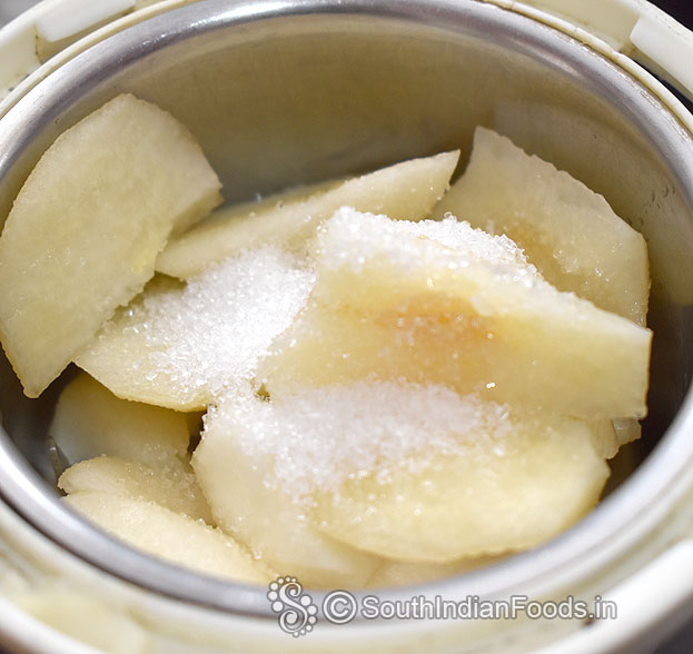 In a mixer jar, add pear cubes & sugar