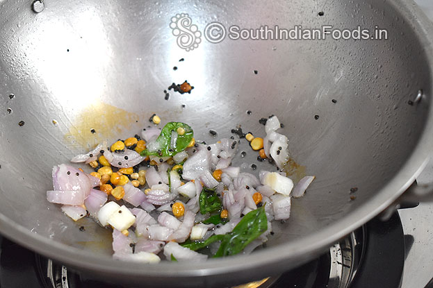 Heat oil, add mustard, urad dal, bengal gram, onion, garlic & curry leaves