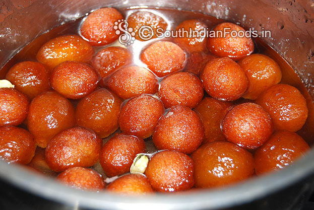Add fried balls in to the sugar syrup & leave it for 15 min