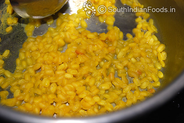 Boil moong dal with turmeric powder