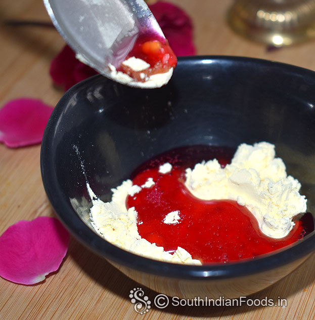 In a bowl, add custard powder, rose syrup, milk mix well without lumps