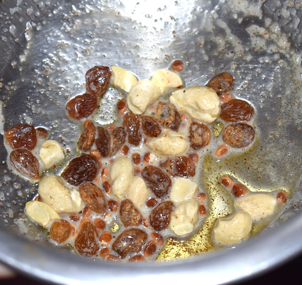 Heat 1.5 tbsp ghee, add cashews, raisins, chironji saute for a min
