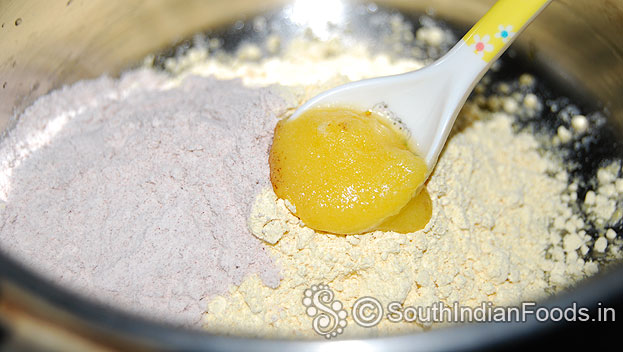 In a bowl add red rice flour, gram flour & ghee