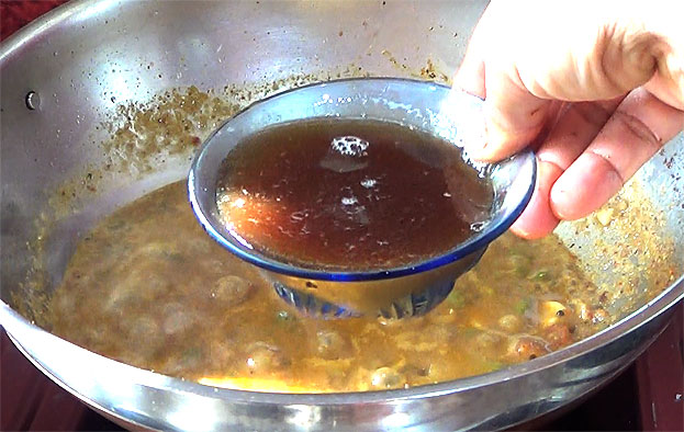 Add tamarind water, boil till raw smell out