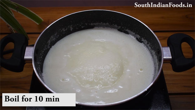 Heat sweet condensed milk in a pan, add grated paneer