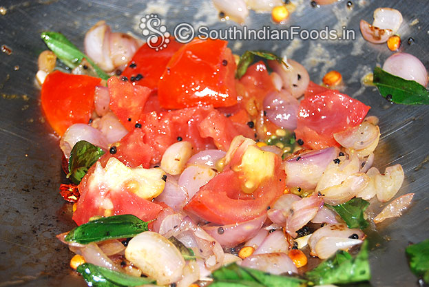 Add chopped tomato saute